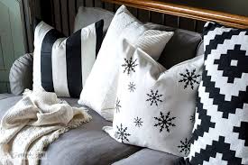 stencilled snowflake pillow on the new sofa