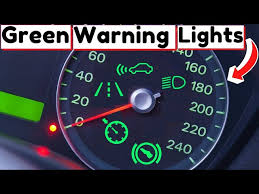 green warning lights on dash in car