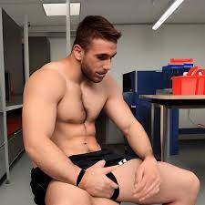 Hot Rugby Player in a Lab with a Big Bulge in His Shorts · Creative Fabrica