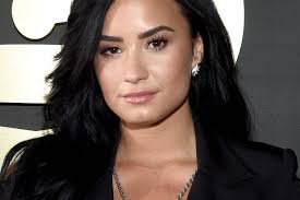 demi lovato wants women to help other