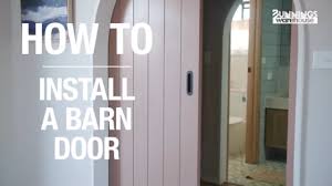 how to install a barn door the step