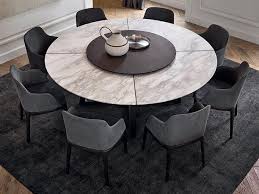A dining table is perhaps one of the most functional furniture in homes. The Most Elegant Round Dining Room Tables 2021 Round Dining Room Table Round Dining Room Dining Table Marble