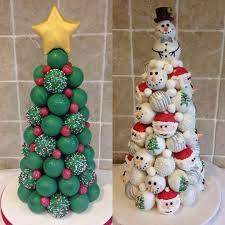 I tend to go with the melted white almond bark because it's not quite as thick as the candy melts and it just. Christmas Cake Pop Cakes Christmas Sweets Christmas Cake Balls Christmas Treats