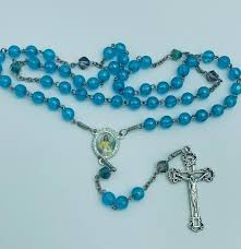handmade rosary with divine mercy