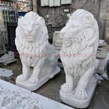 hand carved white marble lion statues