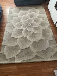 pier 1 wool flower carpet rug