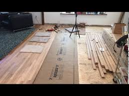 installing a wood floor against the