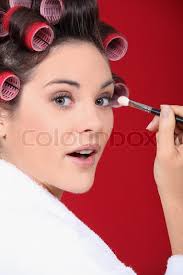 Roll strands of hair on each roller. Woman With Curlers In Her Hair Putting Stock Image Colourbox