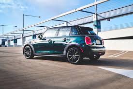 The mini countryman's colour line, seen along the door panel, armrest surfaces and knee pads under the dashboard, comes in a variety of tones including hazy grey, piano black, piano black illuminated, john cooper works piano black and shaded silver. Ford Fiesta Hatchback Vs Mini Cooper 4 Door Hardtop