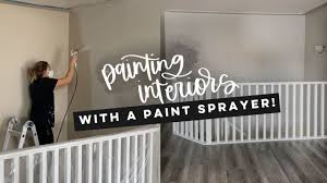 painting interior walls with a sprayer