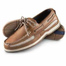 blue and brown laced men s boat shoes