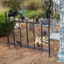 Spread faux spider webs across your fence and make it look as if your property has been deserted. How To Make A Diy Halloween Cemetery Picket Fence Entertaining Diva From House To Home