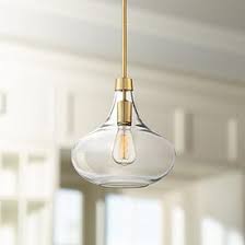 In addition to layering task and ambient kitchen lighting, incorporate a fixture that makes a statement. Gold Pendant Lighting Lamps Plus