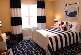 Navy blue and white are classic colors to use when designing a nautical themed bedroom. Gavin S Nautical Room Project Nursery Boys Room Nautical Boys Nautical Bedroom Nautical Room