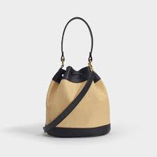 1,085,991 likes · 1,033 talking about this · 469 were here. Furla Small Corona Drawstring Bucket Bag In Beige Black Lyst