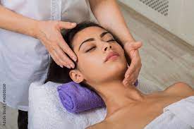 Woman massagist make face lifting massage in spa wellness center Stock  Photo | Adobe Stock