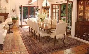 antique laver kirman rug in dining room