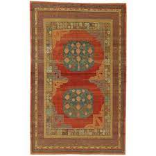 khotan rug with pomegranate design