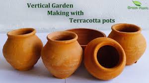 vertical garden using terracotta pots