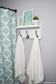 Stack up some extra toilet paper rolls in a section and place a house plant in the other section. 20 Genius Diy Towel Rack Ideas The Handyman S Daughter