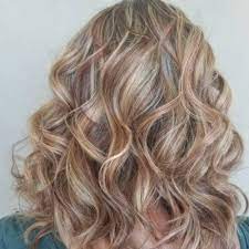 The base color here is a warm and rich brown while the highlights themselves are a creamy and white blonde. 15 Best Red Highlights For Every Hair Shade