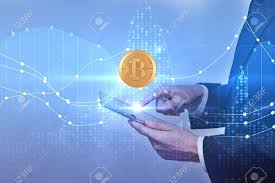 Side View Of Businessman Using Tablet With Golden Bitcoin And