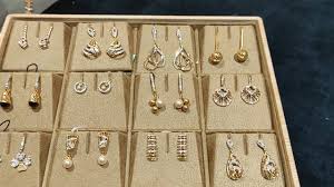 tanishq 14kt mia diamonds earrings