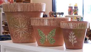 decorate a terra cotta plant pot with