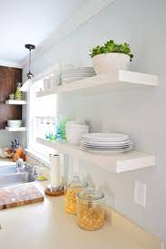 hanging ikea floating shelves in our
