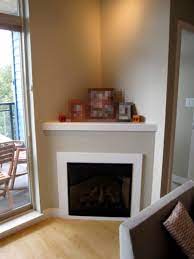 decorate a corner fireplace mantel