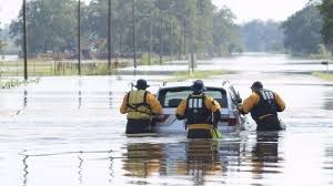 Image result for pictures of people in hurricanes