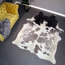 white cowhide rug