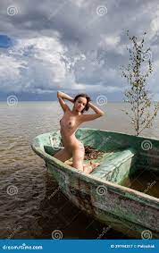 Nude Woman Sitting in a Boat Stock Image - Image of bare, female: 29194317