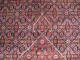 learn about persian mahi design rugs