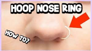 how to put in a hoop nose ring