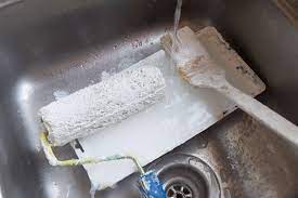 remove dry paint from kitchen sink