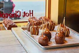 Premium Photo | Image of homemade caramel apples covered in ...
