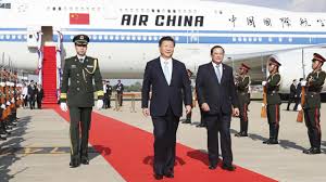 president xi arrives in laos for state
