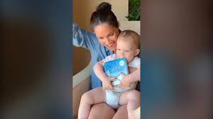 Prince harry pictured in a similar blue romper in the grounds of highgrove with his mum. Prince Harry Meghan Markle Share Sweet Video Of Son Archie On 1st Birthday National Globalnews Ca