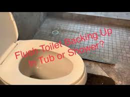 Flush Toilet Backing Up In Shower Or