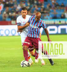 Anthony Nwakaeme of Trabzonspor and Lorenzo Pellegrini of Roma during the  Europa Conference League play