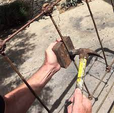 repairing bent rods on old iron beds