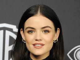 lucy hale wears red lipstick in a