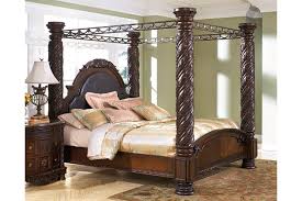 Ashley furniture b553 north shore collection a rich traditional design and exquisite details come together to create the ultimate in the grand style of the north shore bedroom collection. North Shore King Poster Bed With Canopy Ashley Furniture Homestore