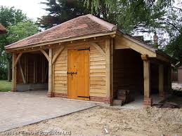 A wooden carport of this size costs around $7,200 when professionally installed over a concrete pad 1, attached to one side of a house, and with two additional walls. Products Sussex Timber Products Ltd