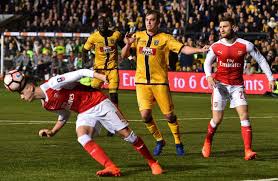 Image result for Arsenal make hard work of non-league Sutton but win in FA Cup fifth round