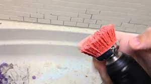 remove dried grout or mortar from tile