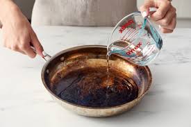 Cleaning a burnt stainless steel pan. How To Clean A Burnt Pot Or Pan How Do You Clean Scorched Stainless Steel Pan Apartment Therapy