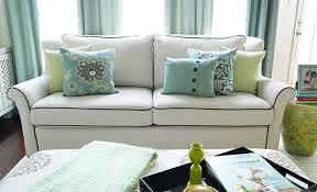 how to arrange pillows on your sofa or
