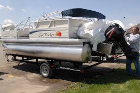 Pontoon Boat Weights On The Trailer On The Water The